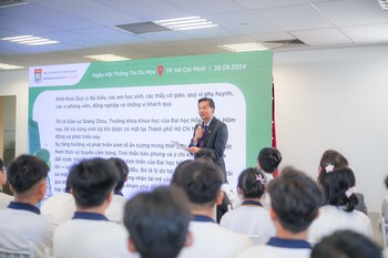 Dean of Science Professor Qiang Zhou welcoming prospective students in Vietnam